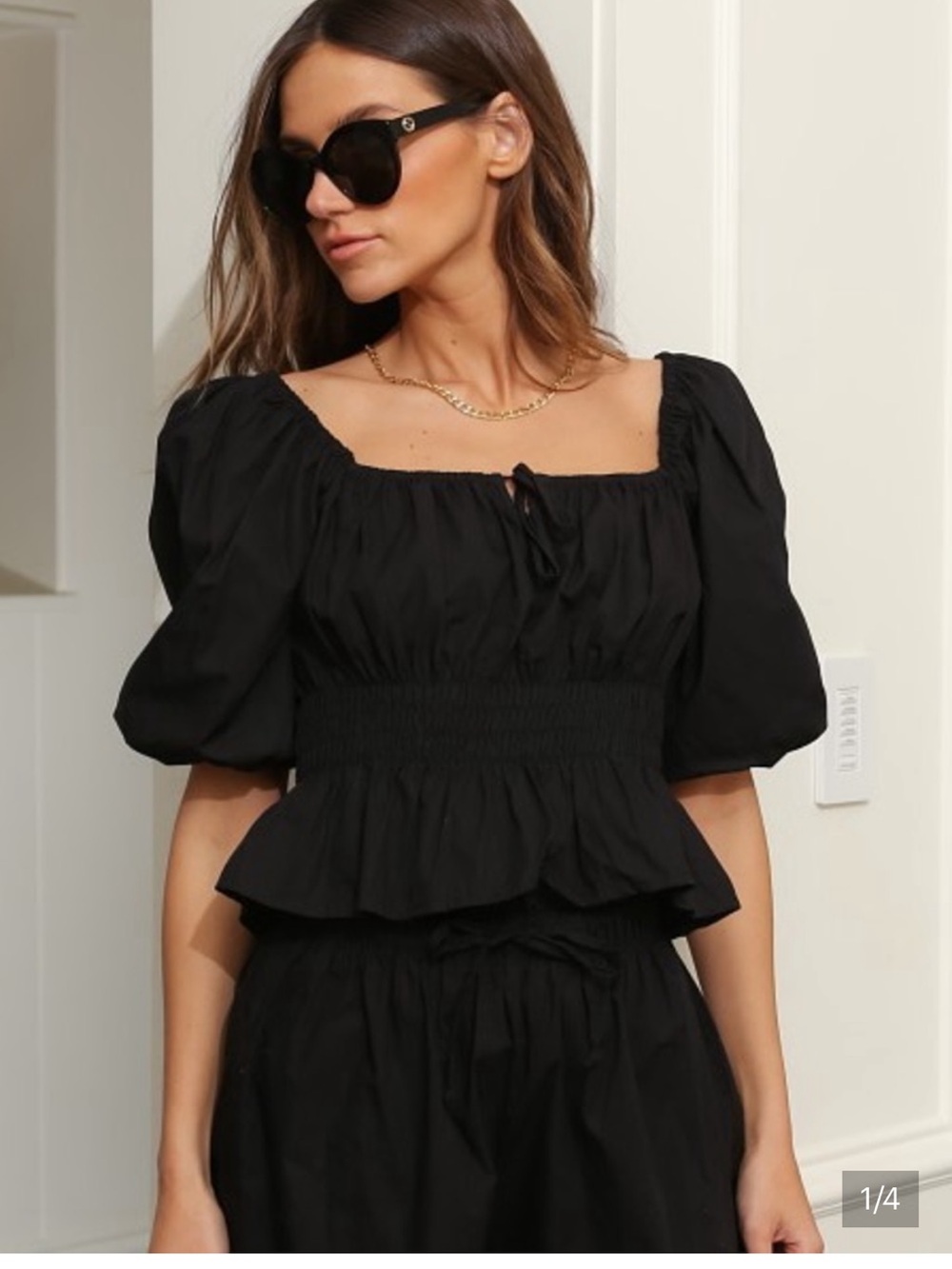 Faithfull the Brand Black Puff-Sleeve Smocked Peplum Top size small